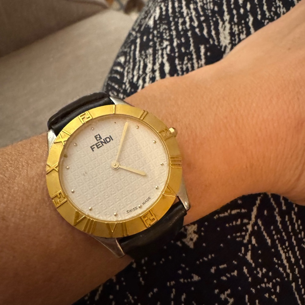 Swiss Fendi watch, leather band. New battery. Works well. Tiny scratches on face